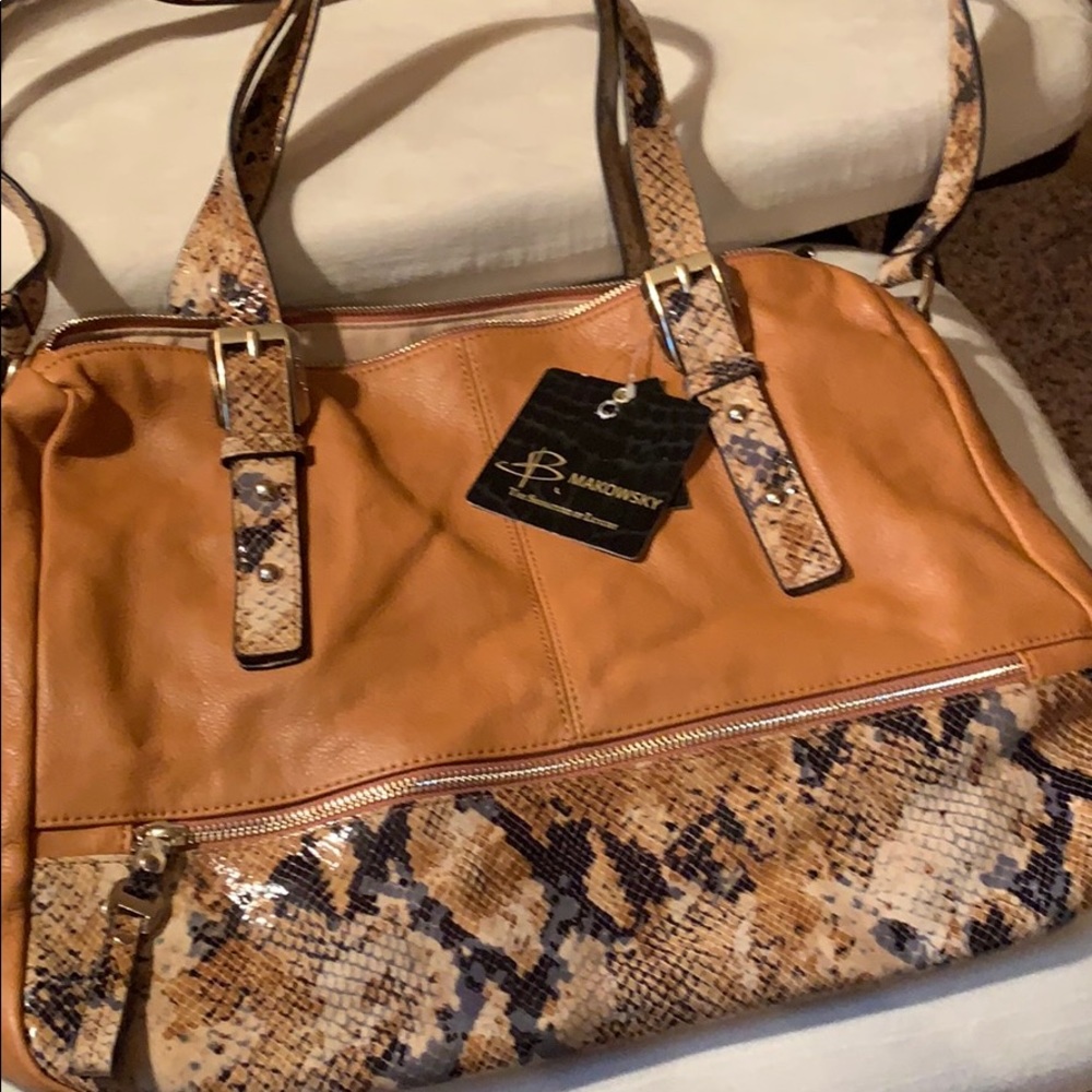 Leather purse. $298, paid $150.
